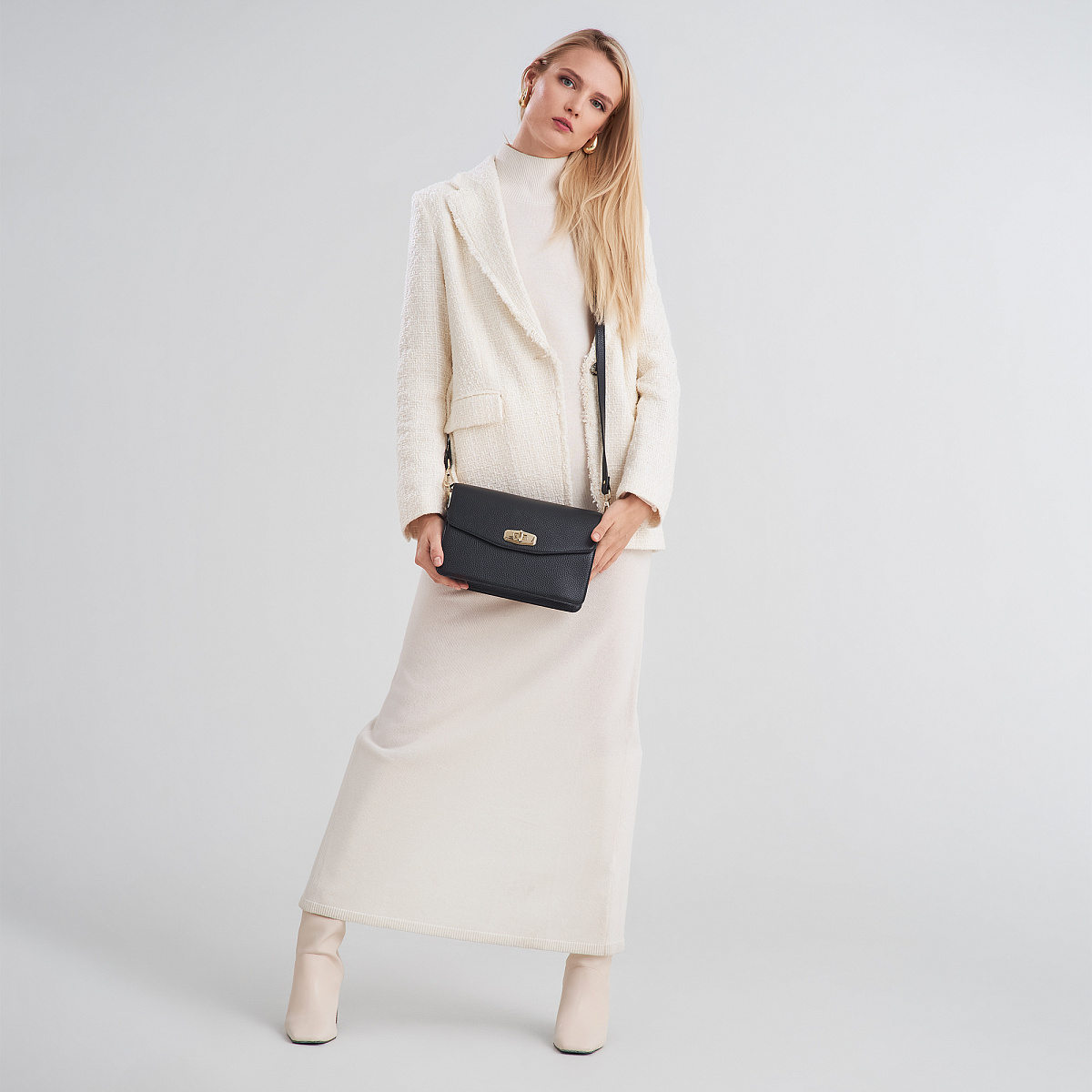 Женская сумка  Dr. Koffer из натуральной кожи черная