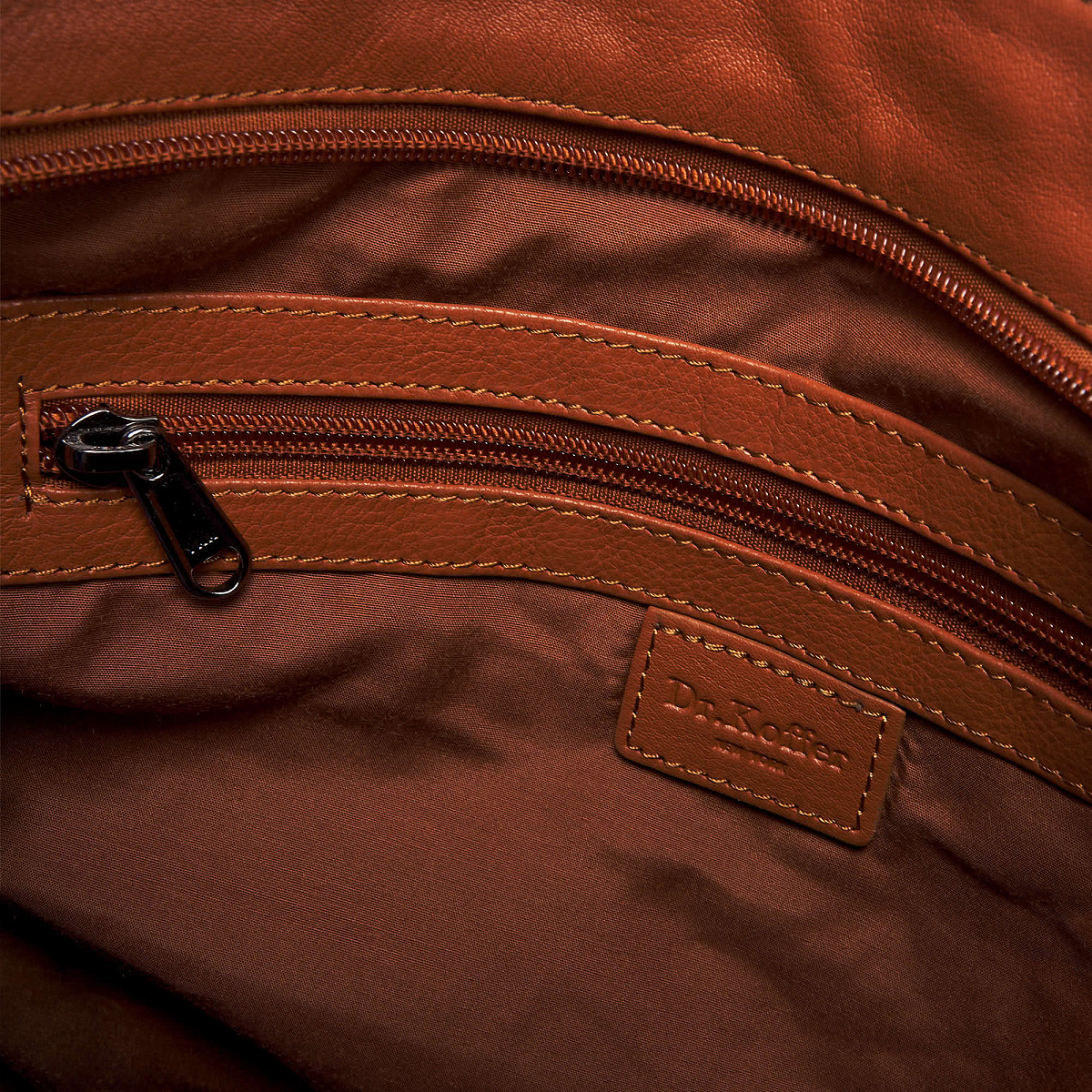 Женская сумка Dr.Koffer из натуральной кожи коричневая