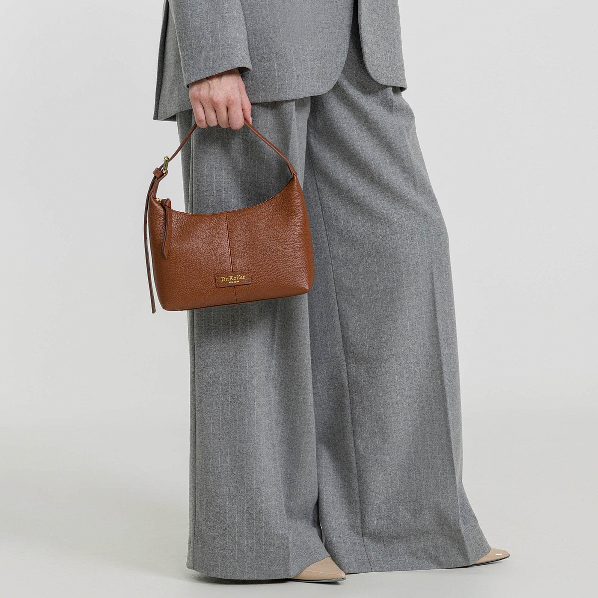 Женская сумка  Dr. Koffer из натуральной кожи коричневая