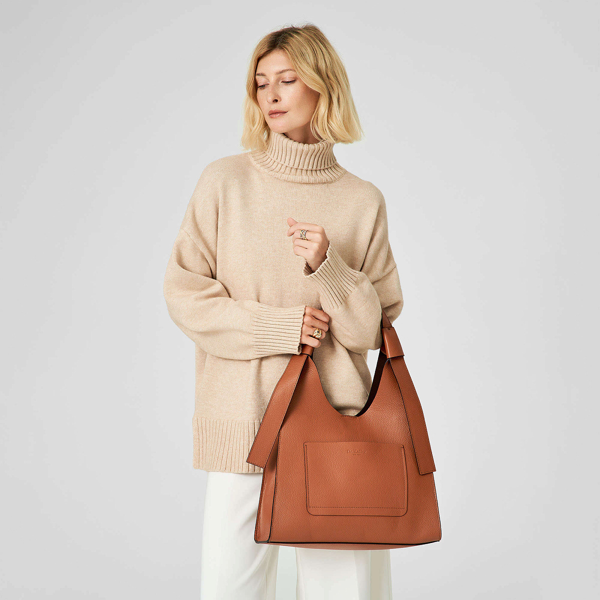 Женская сумка Dr.Koffer из натуральной кожи коричневая