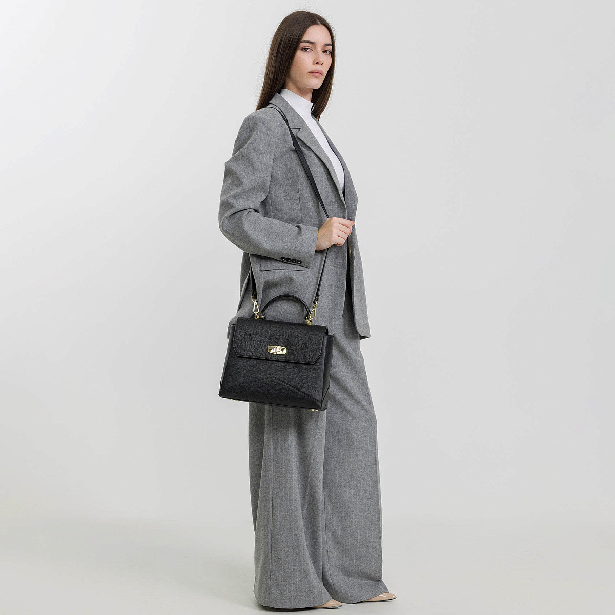 Женская сумка  Dr. Koffer из натуральной кожи черная