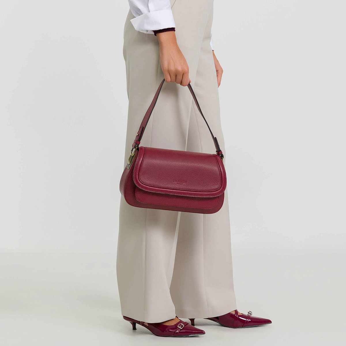 Женская сумка Dr. Koffer из натуральной кожи красная