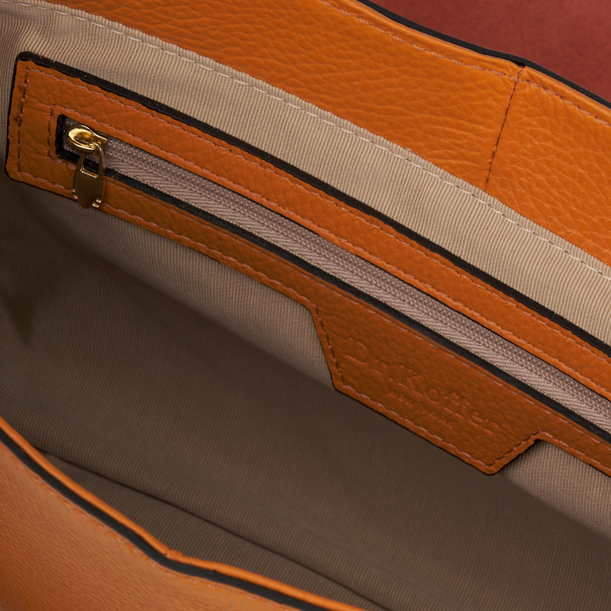 Женская сумка Dr. Koffer из натуральной кожи оранжевая