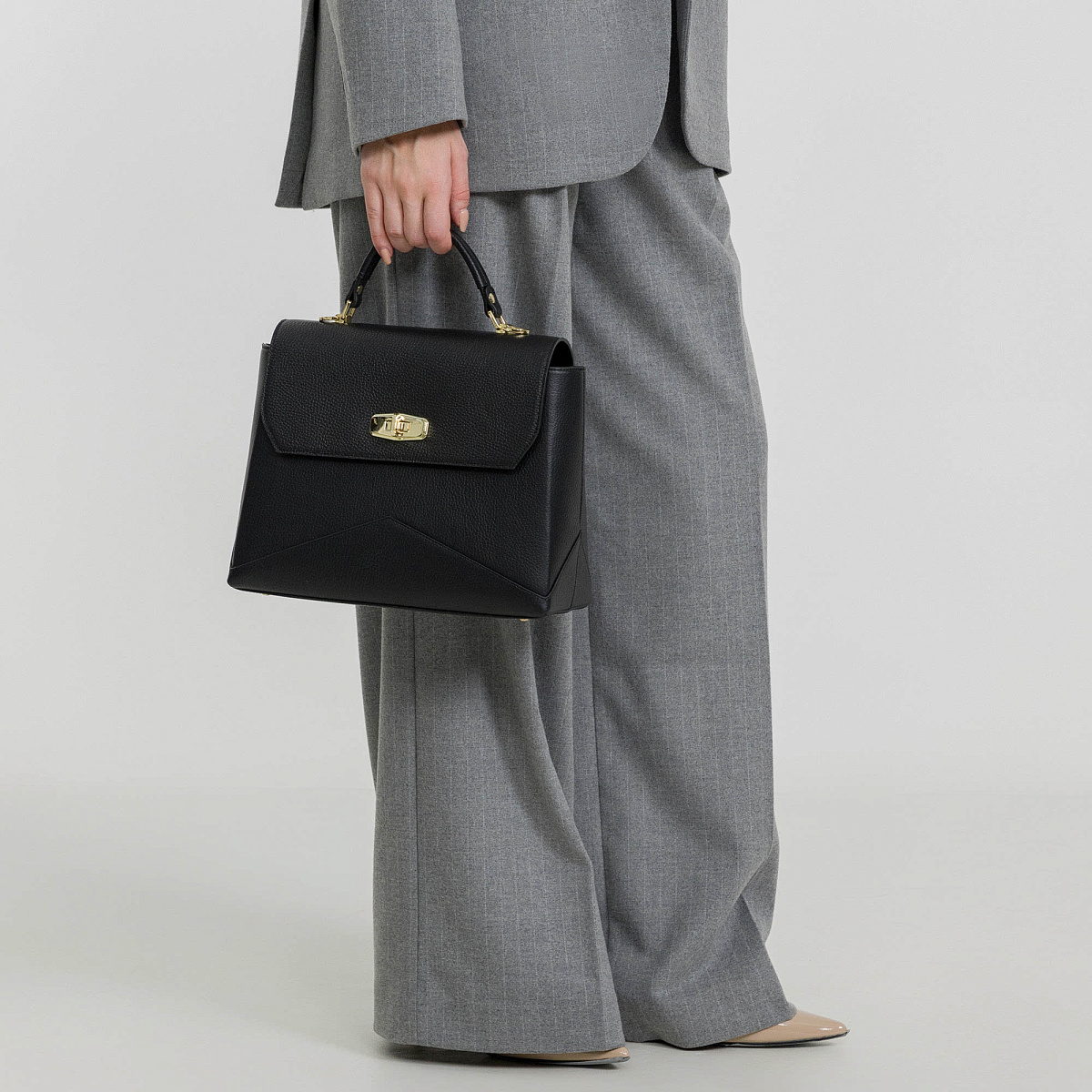 Женская сумка  Dr. Koffer из натуральной кожи черная