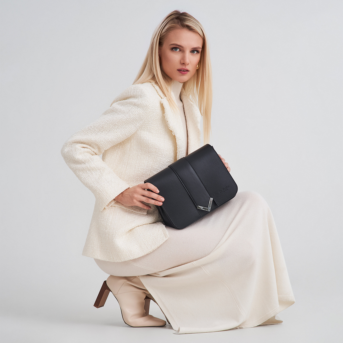 Женская сумка Dr. Koffer из натуральной кожи черная