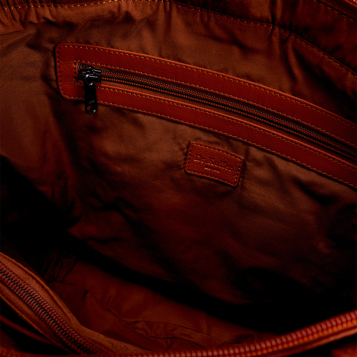 Женская сумка Dr.Koffer из натуральной кожи коричневая