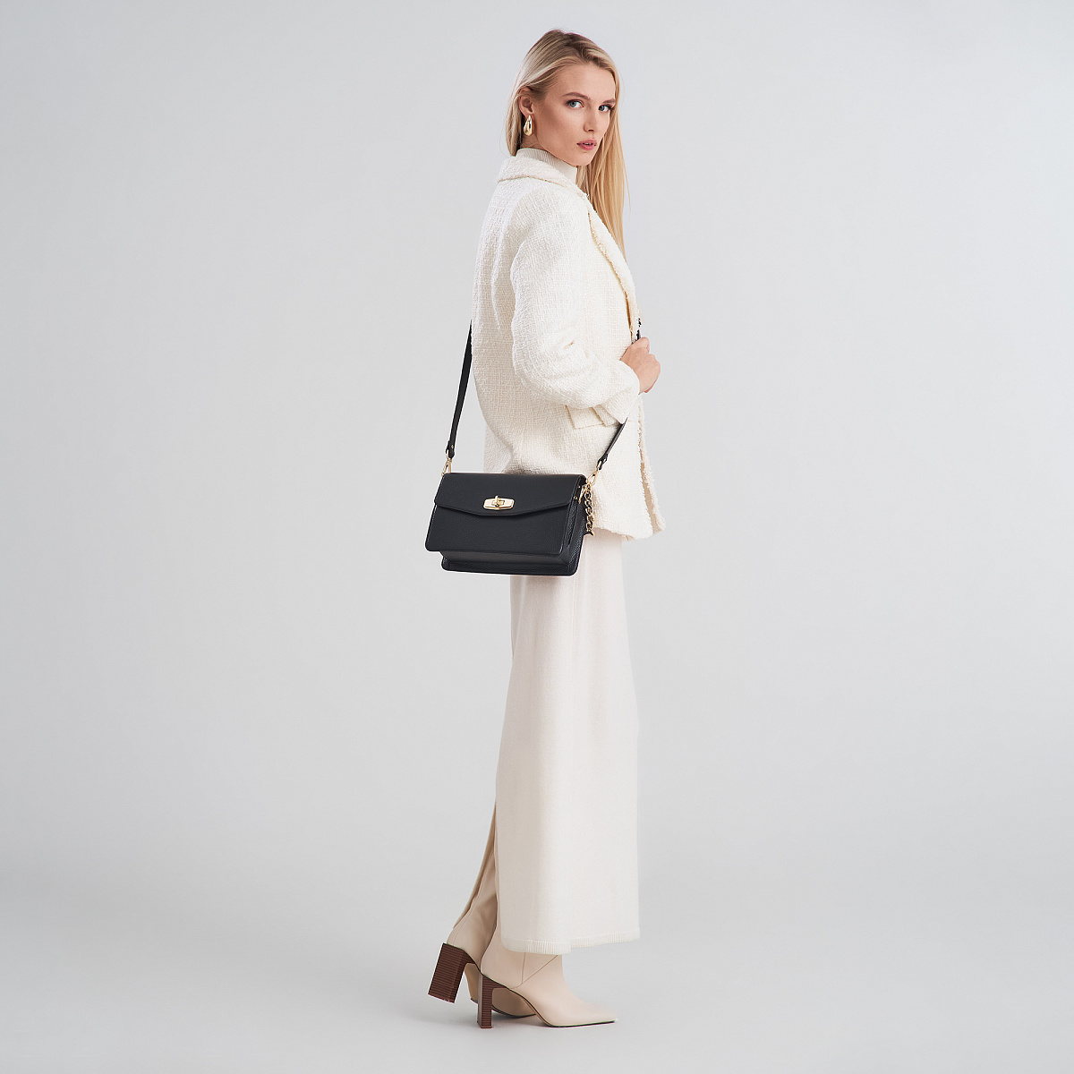 Женская сумка  Dr. Koffer из натуральной кожи черная