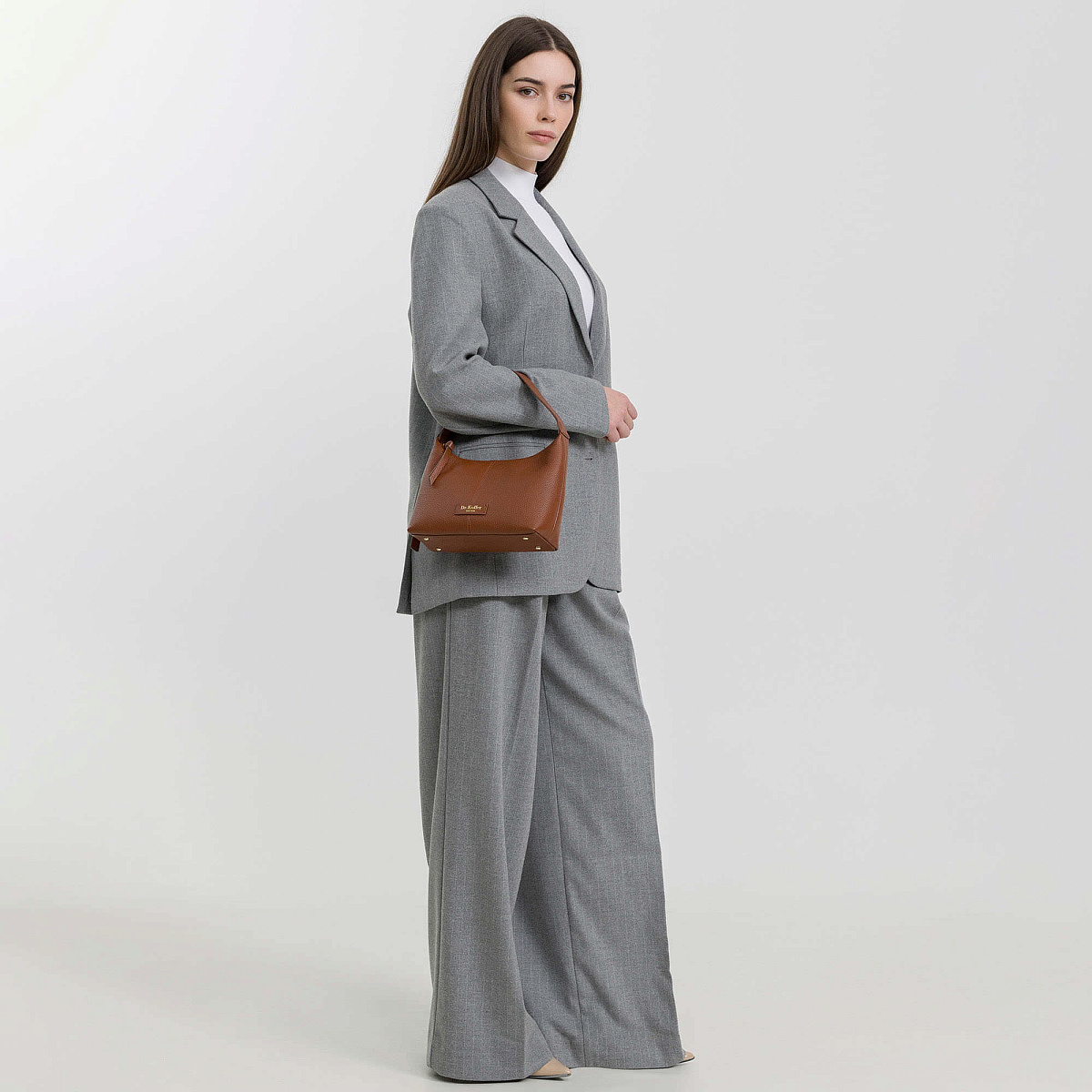 Женская сумка  Dr. Koffer из натуральной кожи коричневая