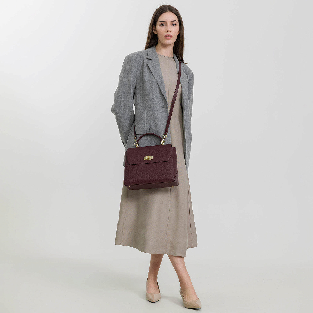 Женская сумка  Dr. Koffer из натуральной кожи бордовая