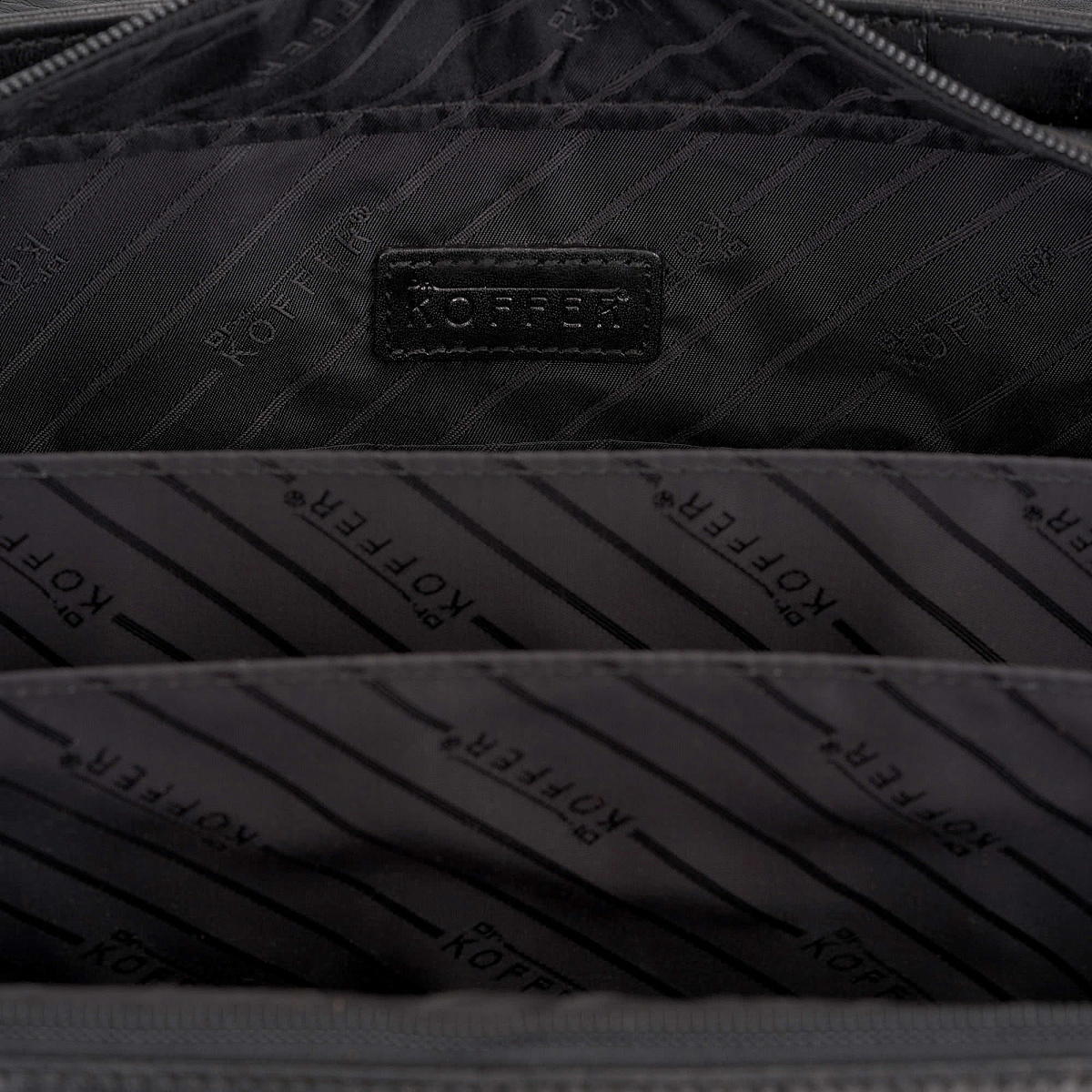 Деловая сумка Dr.Koffer из натуральной кожи черная