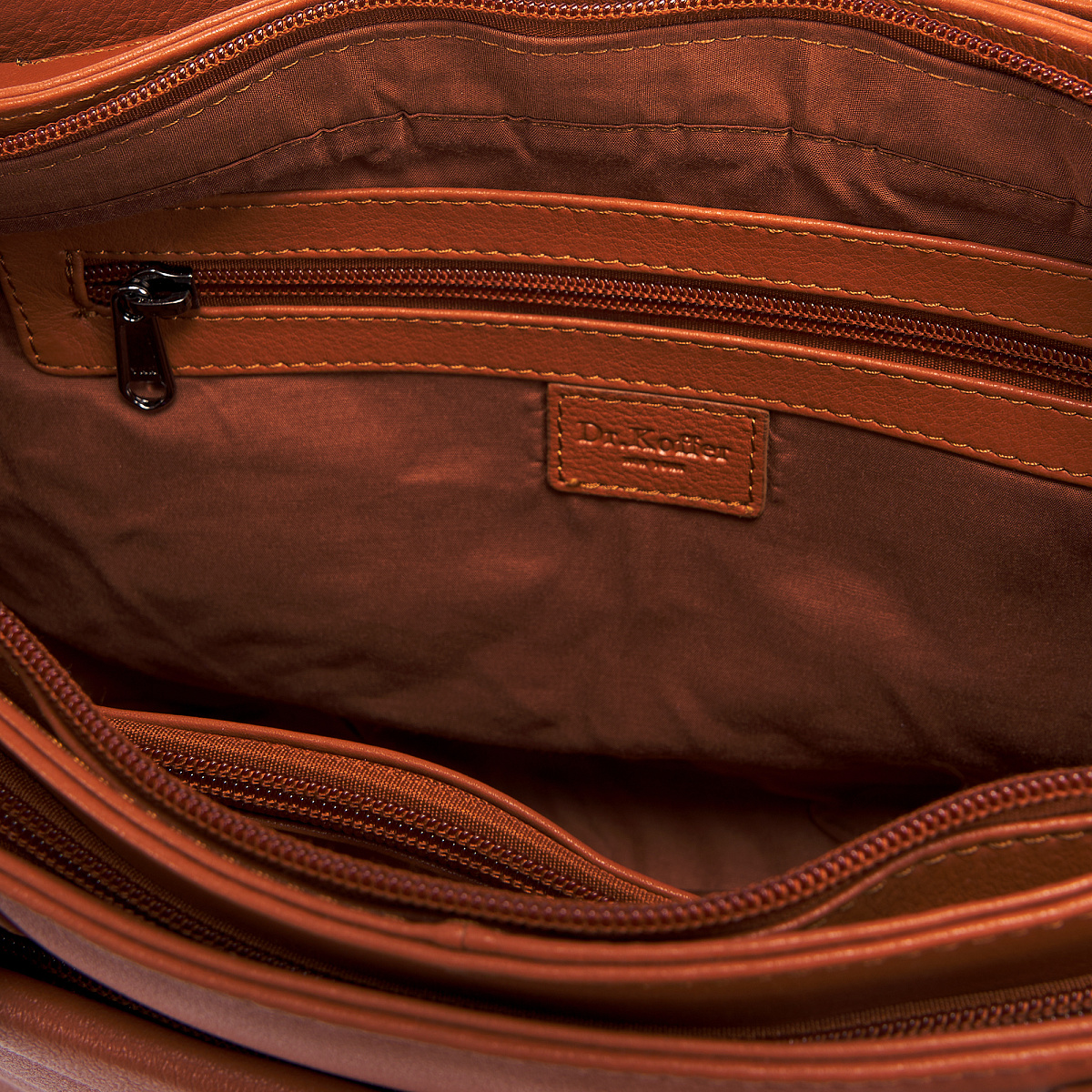 Женская сумка Dr.Koffer из натуральной кожи коричневая